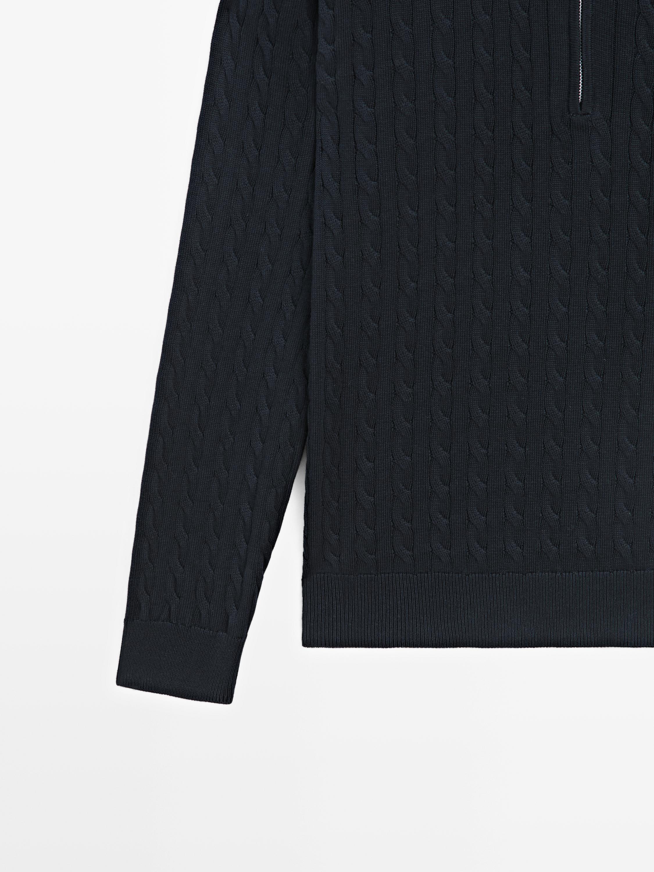 Pull en maille col montant zippé